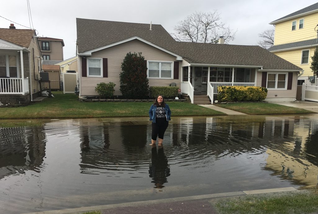 Woman in flooded street