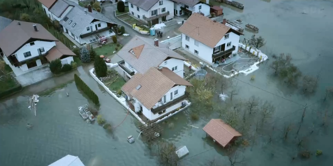 aerial footage of flooded homes. credit: APP