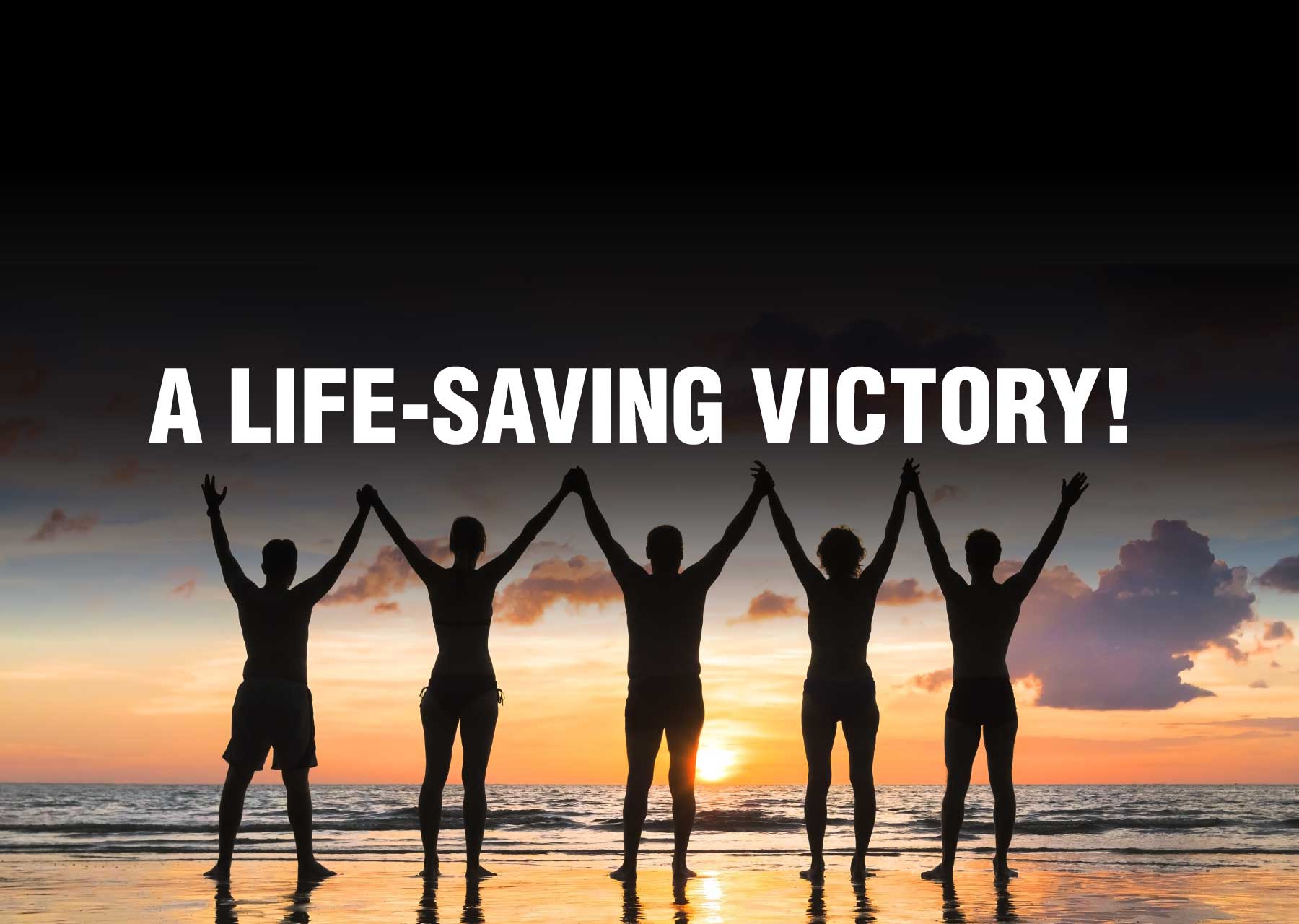 group celebrating a life-saving victory